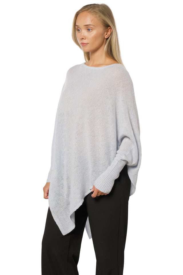 Kashmirponcho med ermer himmelblå